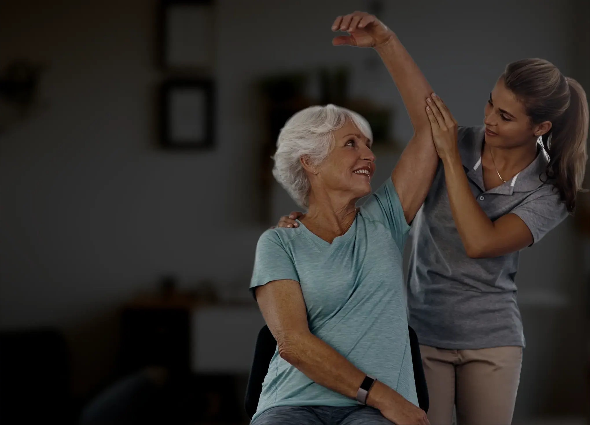 Physical therapist assisting a senior patient in South Florida